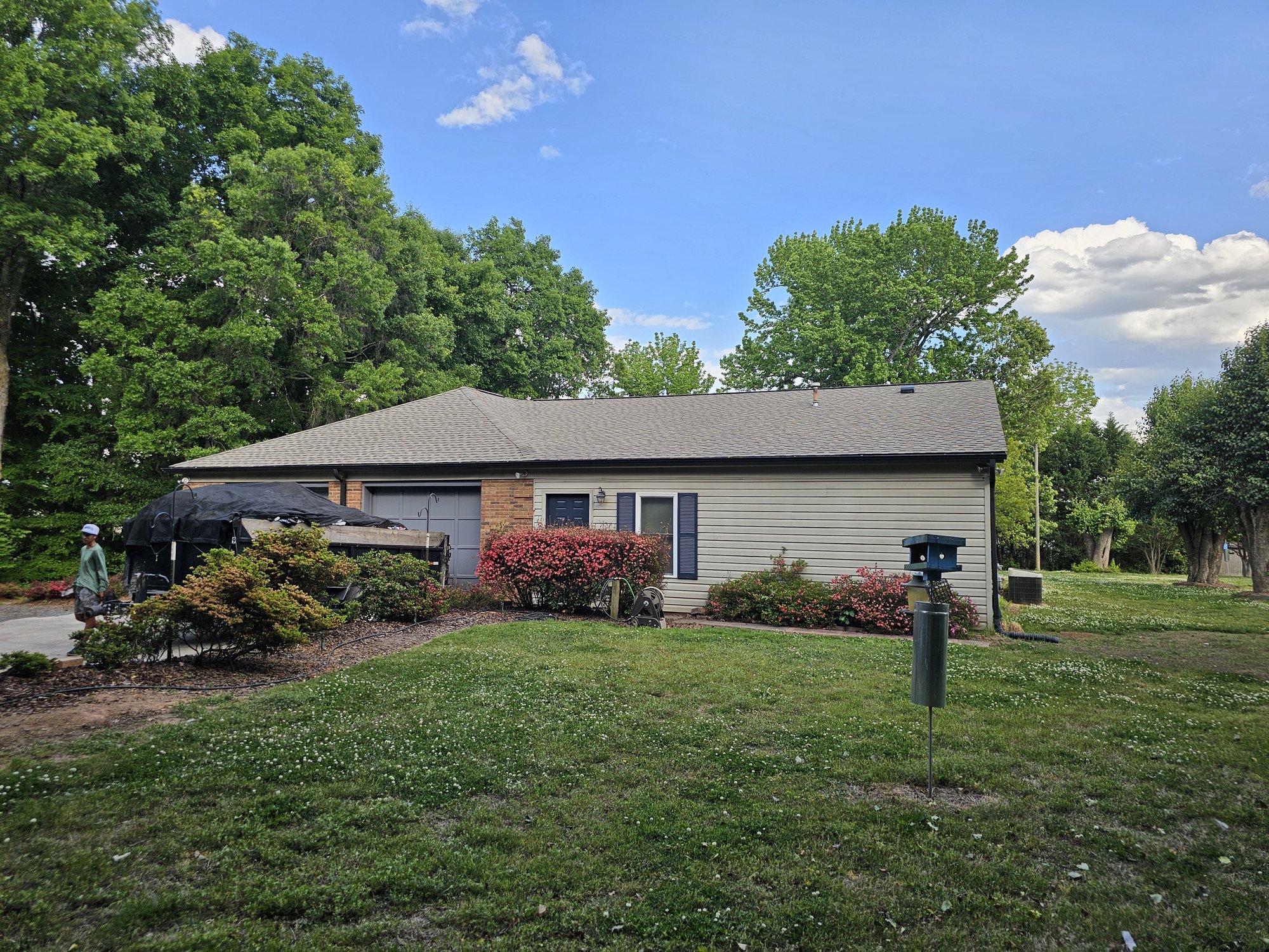 Wide view of a completed residential roof by D&S Roofing and Restoration