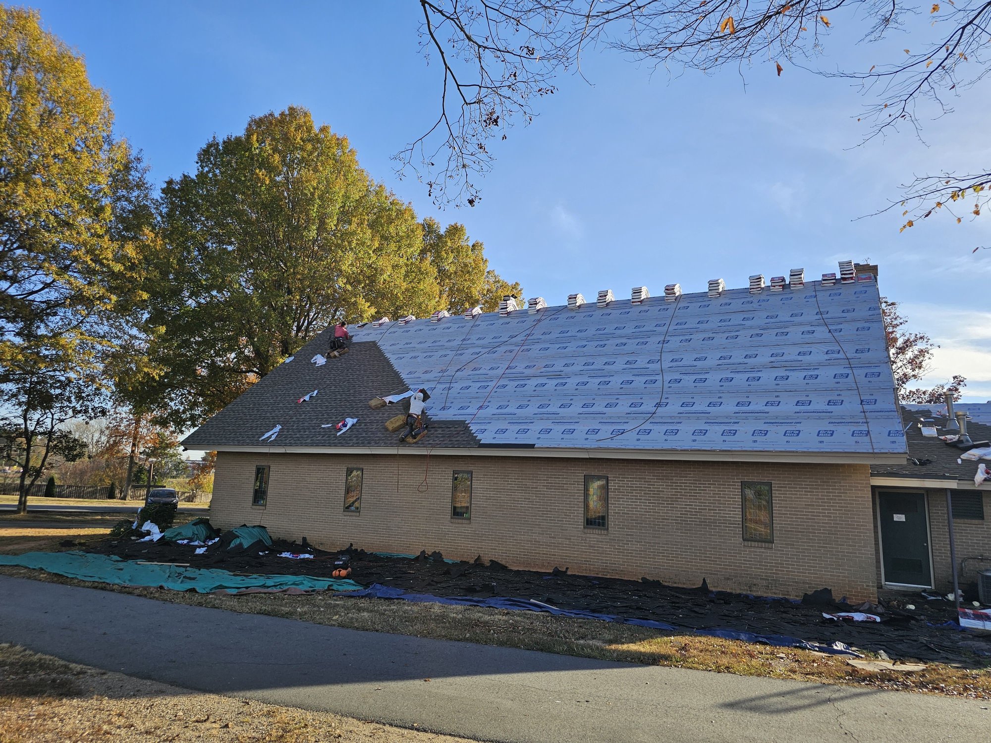 Temporary blue underlayment protection installed by D&S Roofing